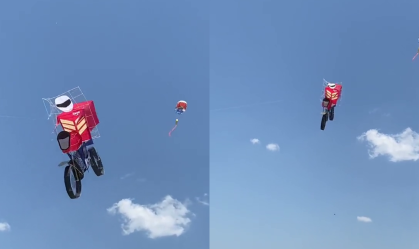 Pipa no formato de motoboy voa no céu e chama a atenção