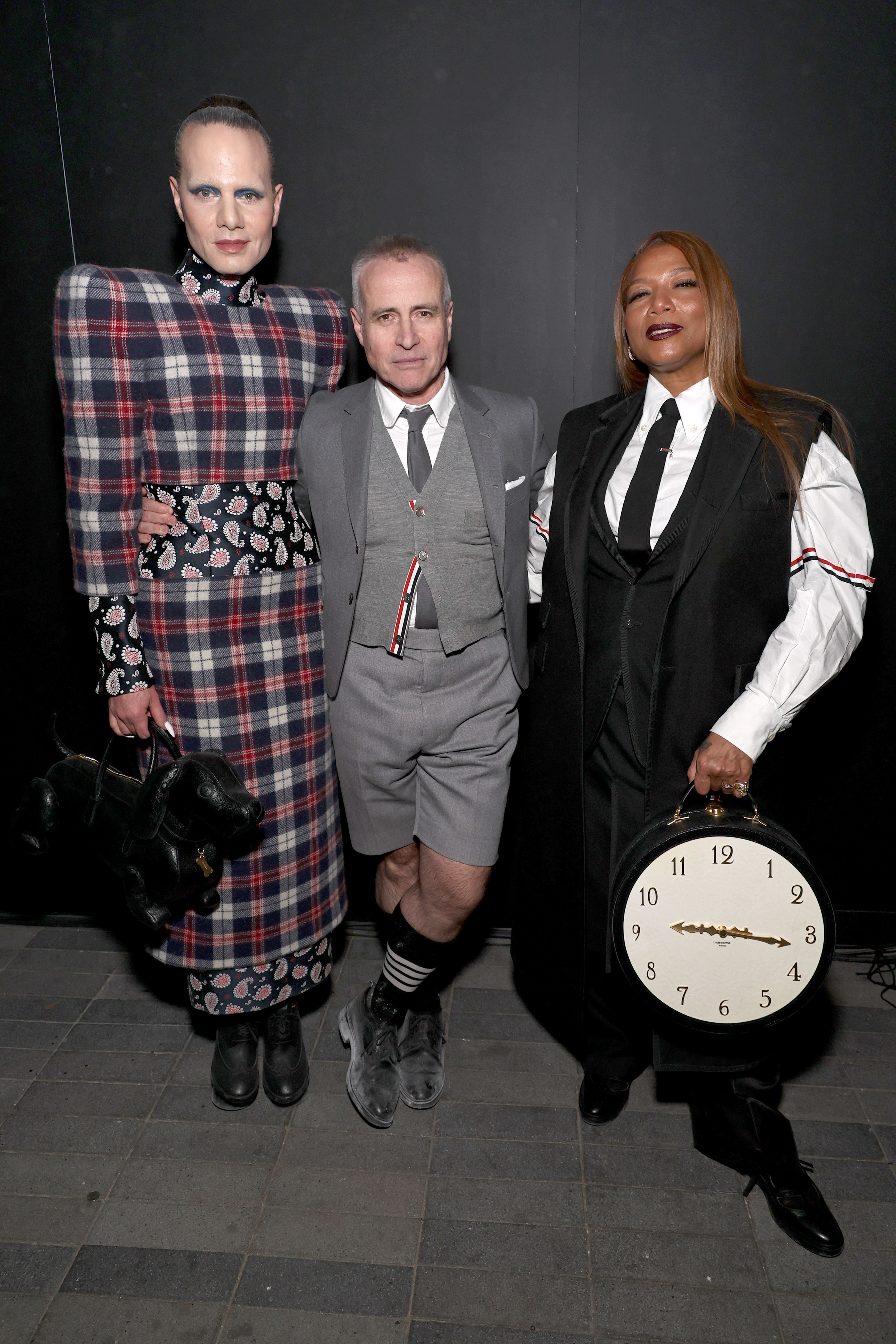 Jordan Roth, Thom Browne e Queen Latifah no desfile de Thom Browne / Jamie McCarthy/Getty Images