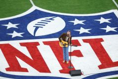 O rapper e cantor americano Post Malone se apresenta antes do Super Bowl LVIII entre o San Francisco 49ers e o Kansas City Chiefs no Allegiant Stadium em 11 de fevereiro de 2024 em Las Vegas, Nevada.