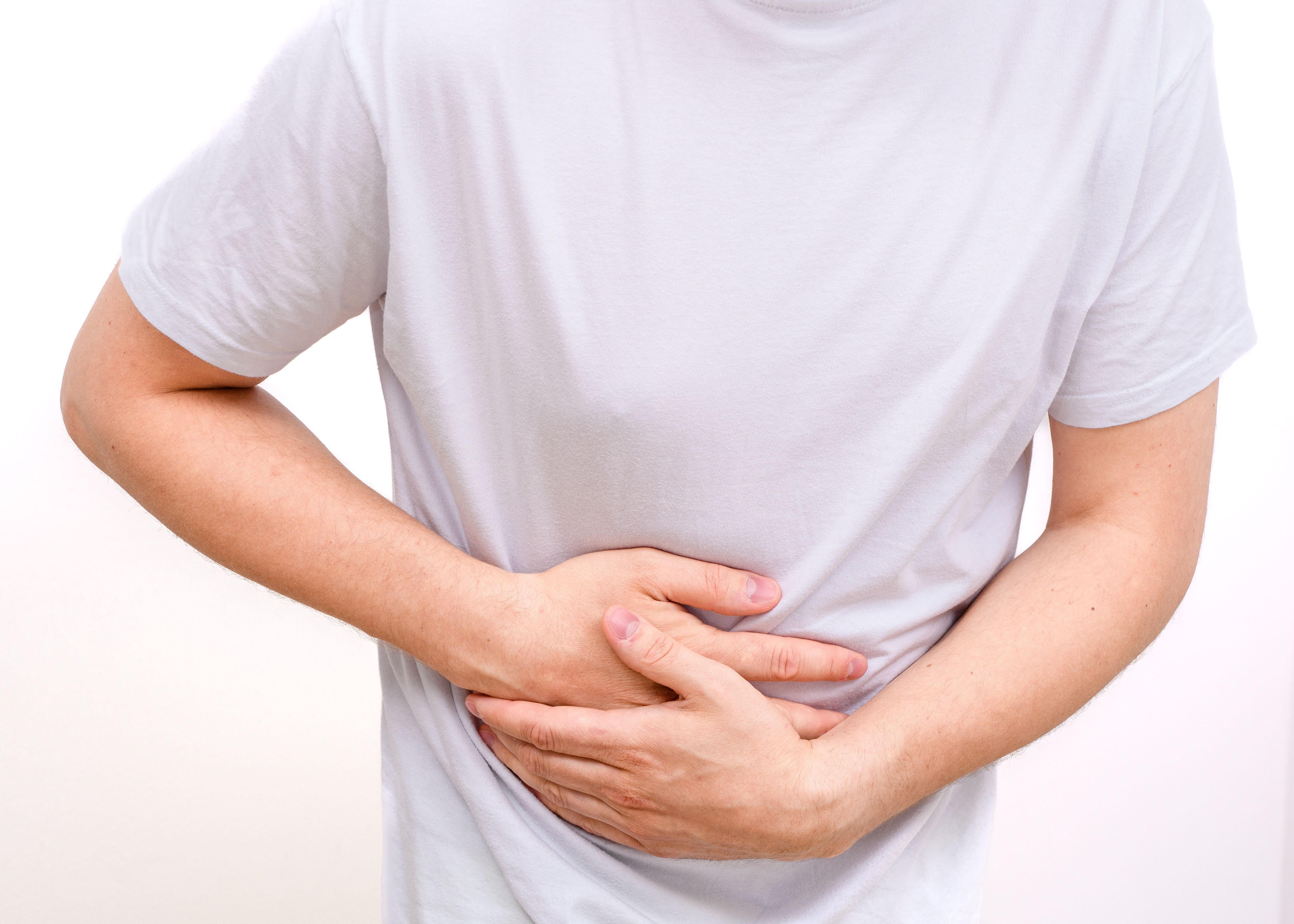 Man holding his stomach, pain