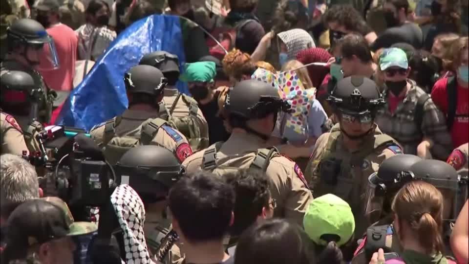 Pro-palestinian protesters face state troopers in Austin