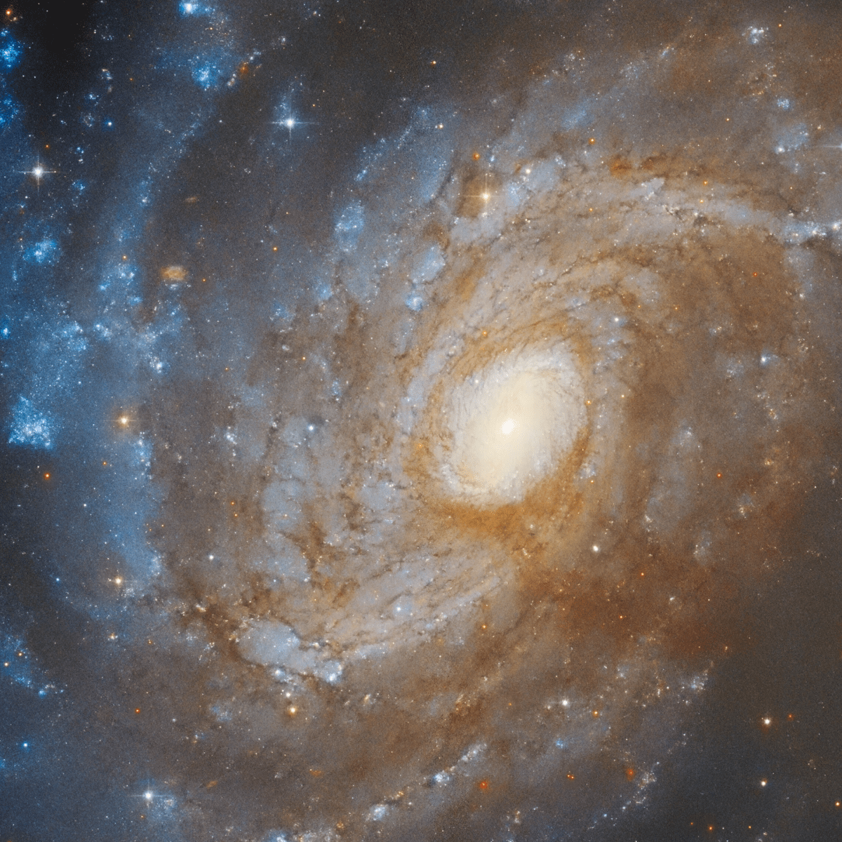 Telescópio Hubble encontra galáxia encoberta por nuvem cósmica