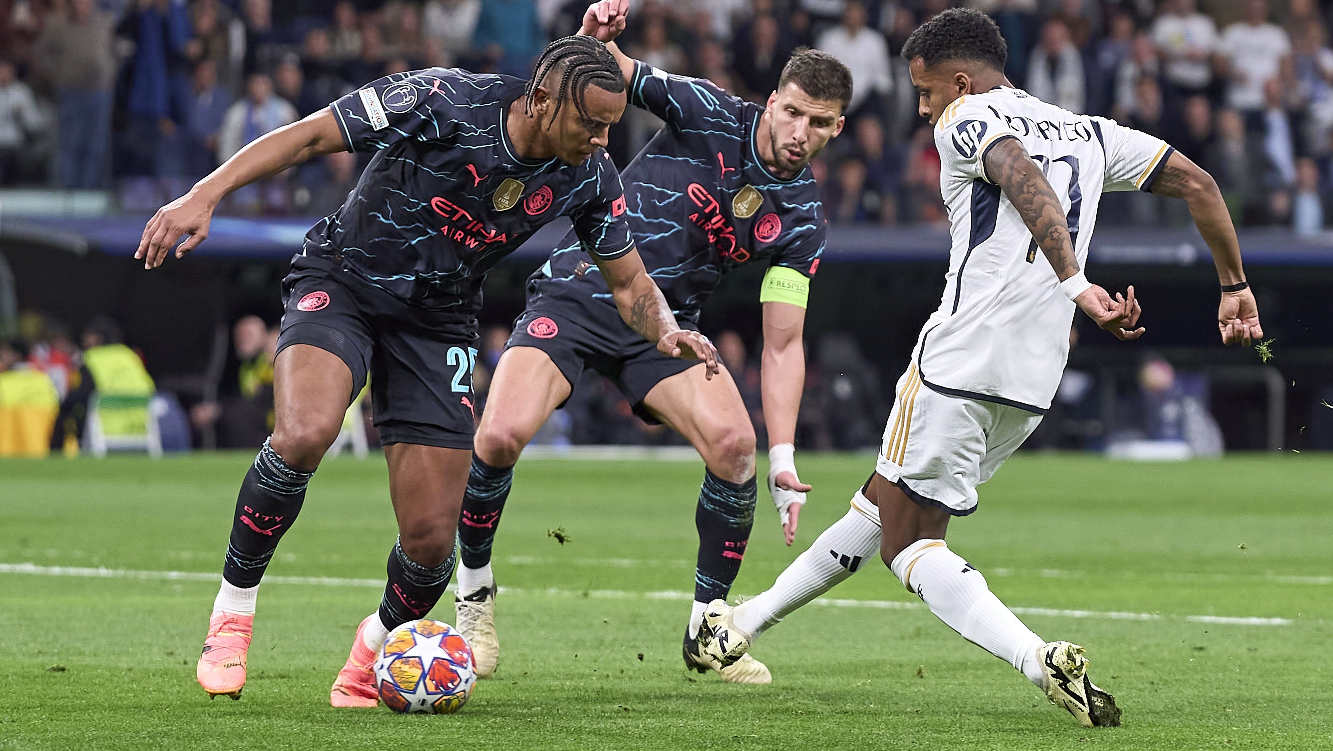 Rodrygo finaliza para marcar um dos gols de Real Madrid 3 x 3 Manchester City