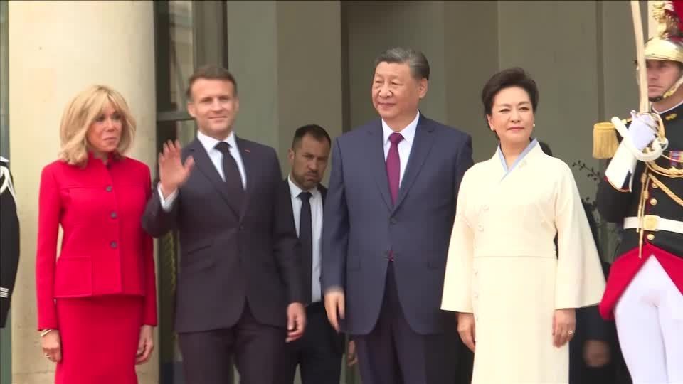 Macron receives Xi at Elysee Palace