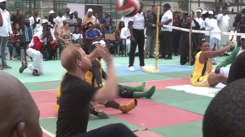 Prince Harry plays sitting volley ball with 'unconquered' athletes during Nigeria visit