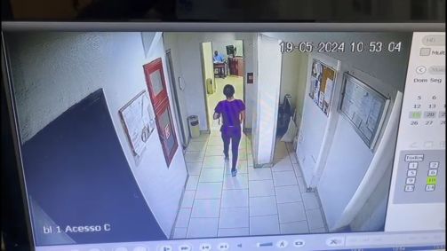 A psicóloga Júlia Andrade Cathermol Pimenta é vista voltando da academia quando o namorado Luiz Marcelo Antônio Ormond já estaria morto