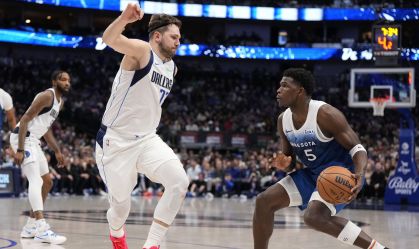 Luka Doncic e Anthony Edwards em partida da NBA