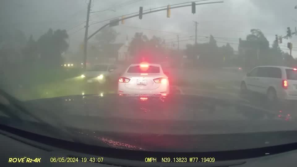 Videos show flying debris, transformers flashing during tornado on Maryland road