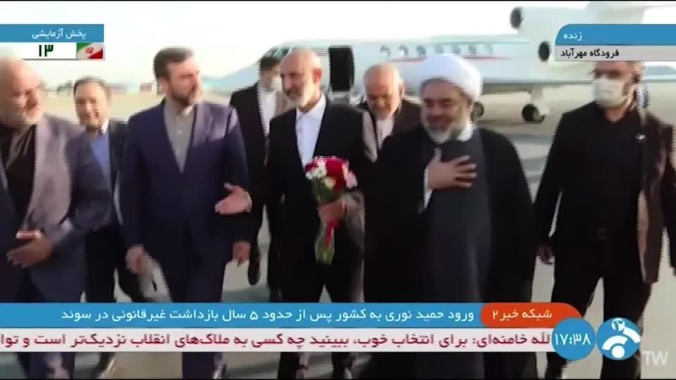 Freed ex Iranian official Noury returns to Tehran after prisoner swap with Sweden
