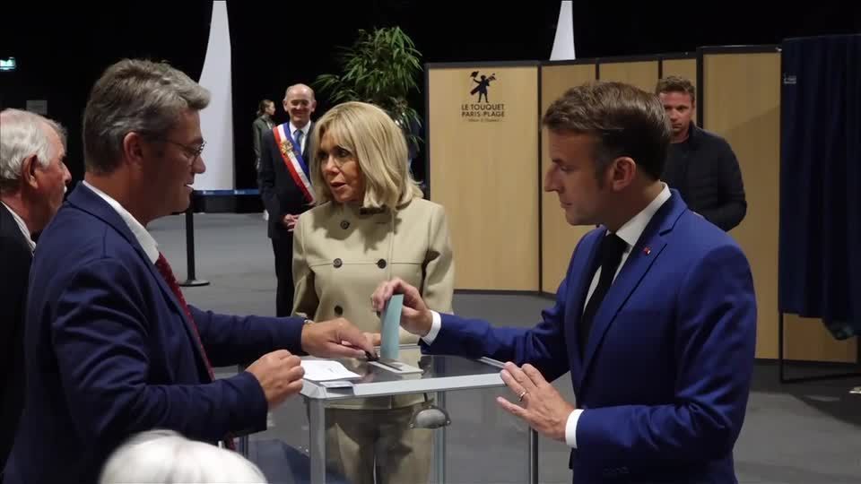 Macron votes in first round of French parliamentary election