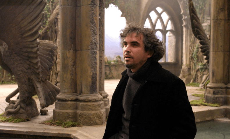 Diretor Alfonso Cuarón no set de filmagens de "Harry Potter e o Prisioneiro de Azkaban", de 2004 / Warner Bros. Ent. Harry Potter Publishing RightsJ.K.R.