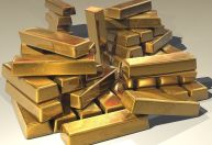 Ouro fecha em alta de mais de 1%, com rebaixamento dos EUA