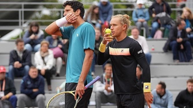 Rafael Matos e Marcelo Melo durante jogo