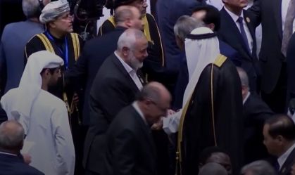 O vice-presidente Geraldo Alckmin (em primeiro plano, ao centro) e o líder político do Hamas Ismail Haniyeh (acima)