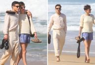 Emma Corrin e Rami Malek passeiam na praia de Ipanema; veja fotos