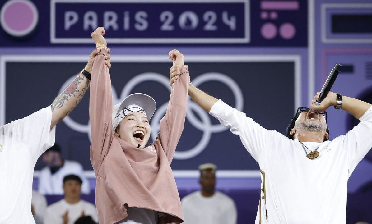 Ami Yuasa, do Japão, comemora a conquista da primeira medalha de ouro / Odd Andersen/AFP/Getty Images