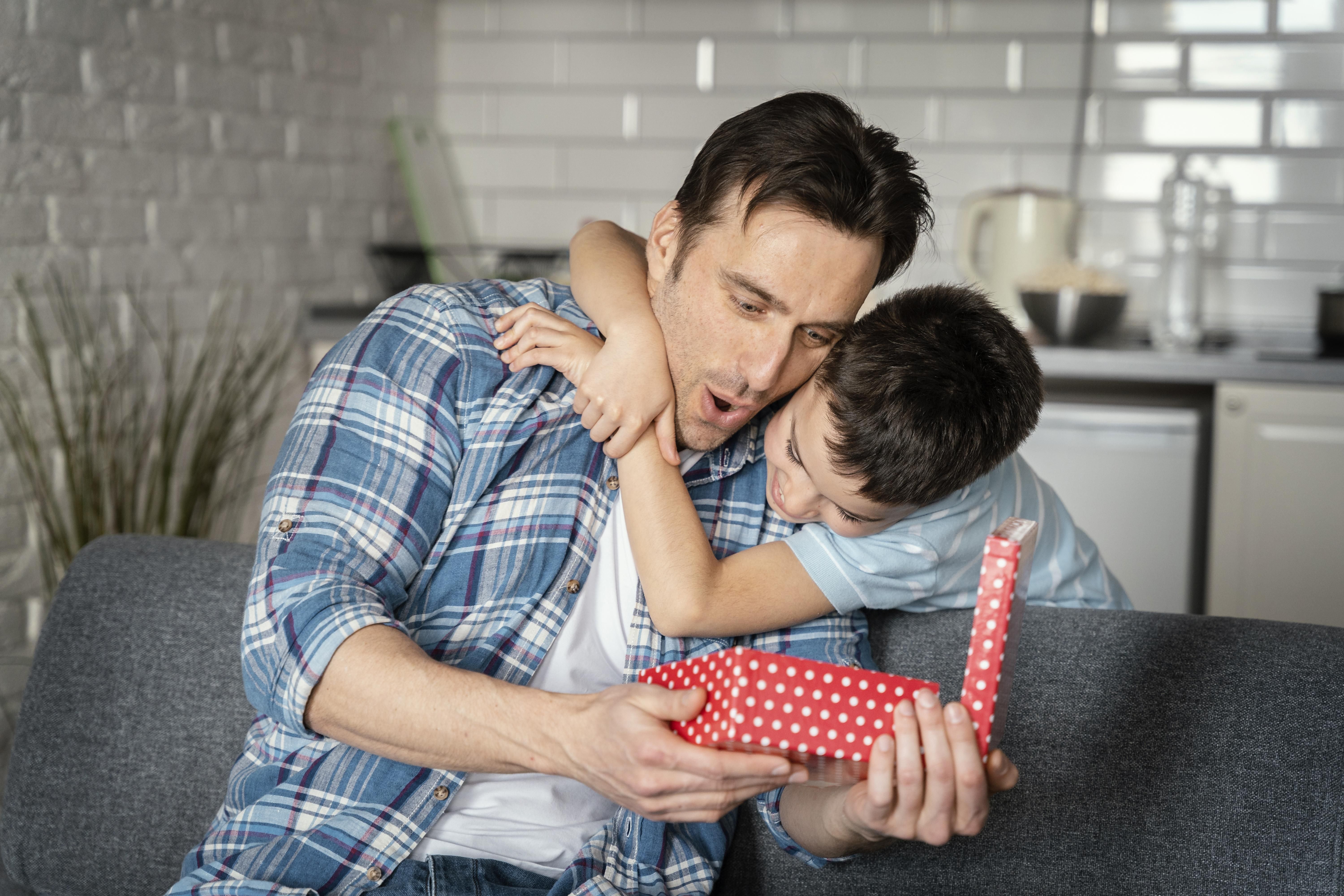 medium-shot-father-holding-present