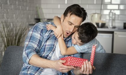 medium-shot-father-holding-present