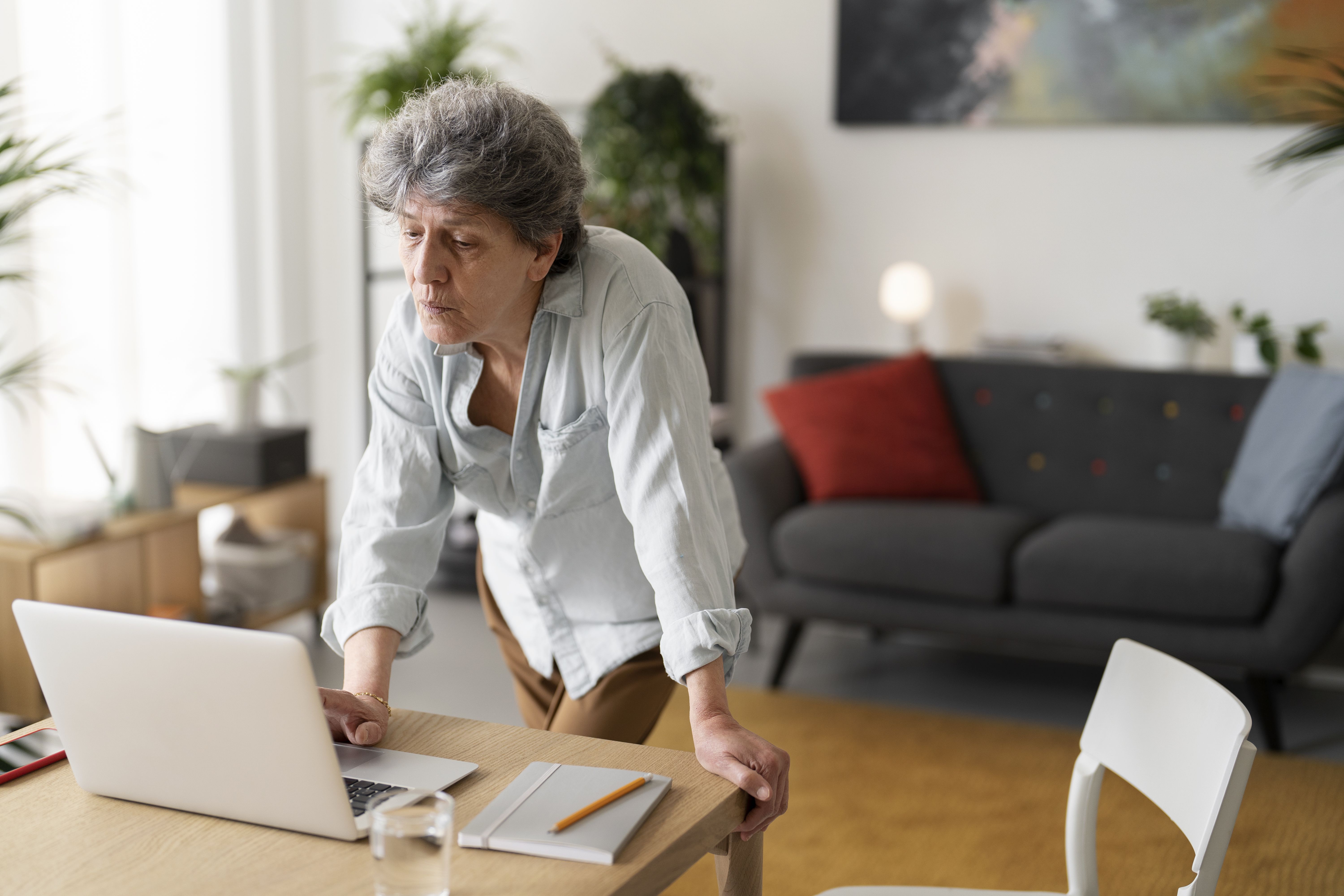medium-shot-old-woman-working