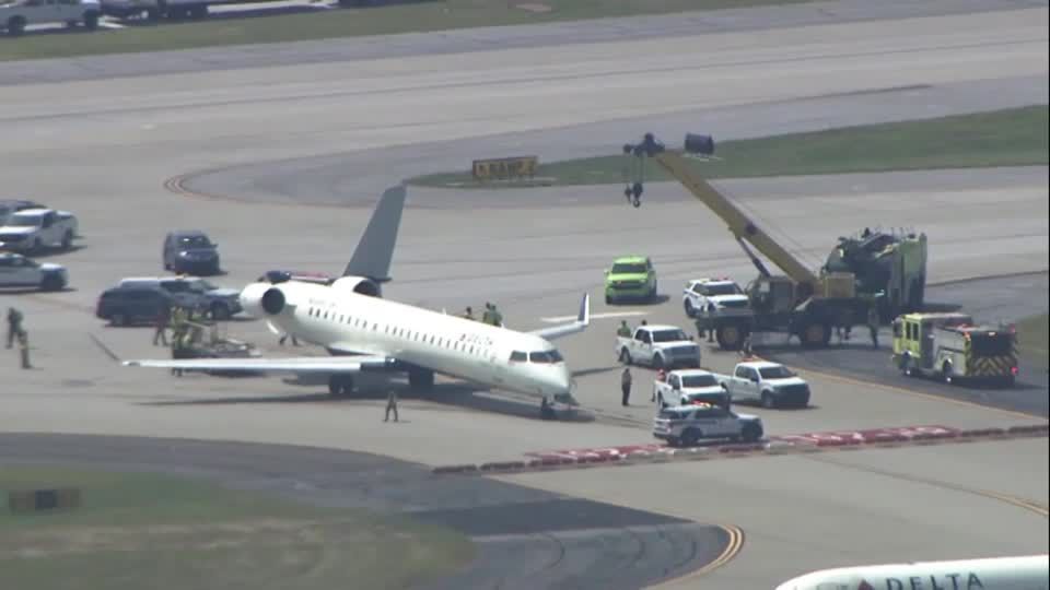 FAA investigating Delta airplane that struck tail of regional jet