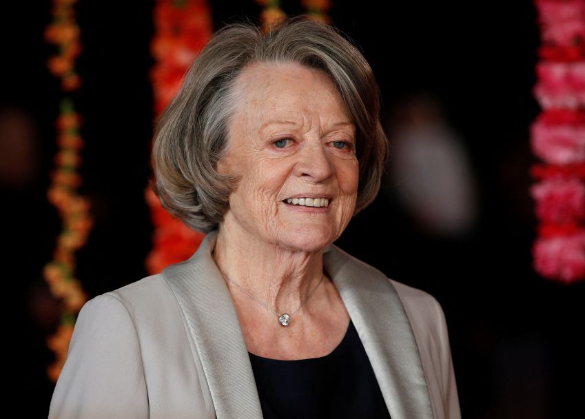 A atriz Maggie Smith chega à Royal Film Performance e à estreia mundial do filme "The Second Best Exotic Marigold Hotel", na Leicester Square, Londres, em 17 de fevereiro de 2015. • REUTERS/Peter Nicholls/Foto de arquivo