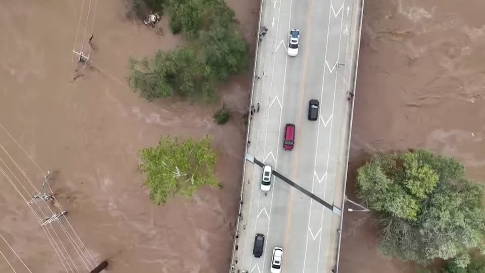 Eyewitness drone shows North Carolina's Asheville severely flooded from Helene