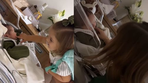 As filhas de Virginia --Maria Flor, 1, e Maria Alice, 3 -- conhecem o irmão recém-nascido, José Leonardo.