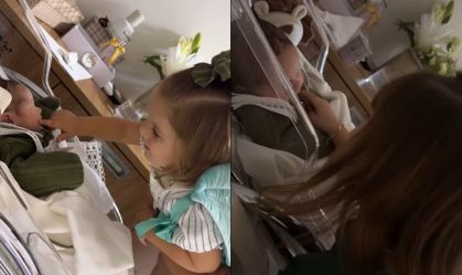 As filhas de Virginia --Maria Flor, 1, e Maria Alice, 3 -- conhecem o irmão recém-nascido, José Leonardo.