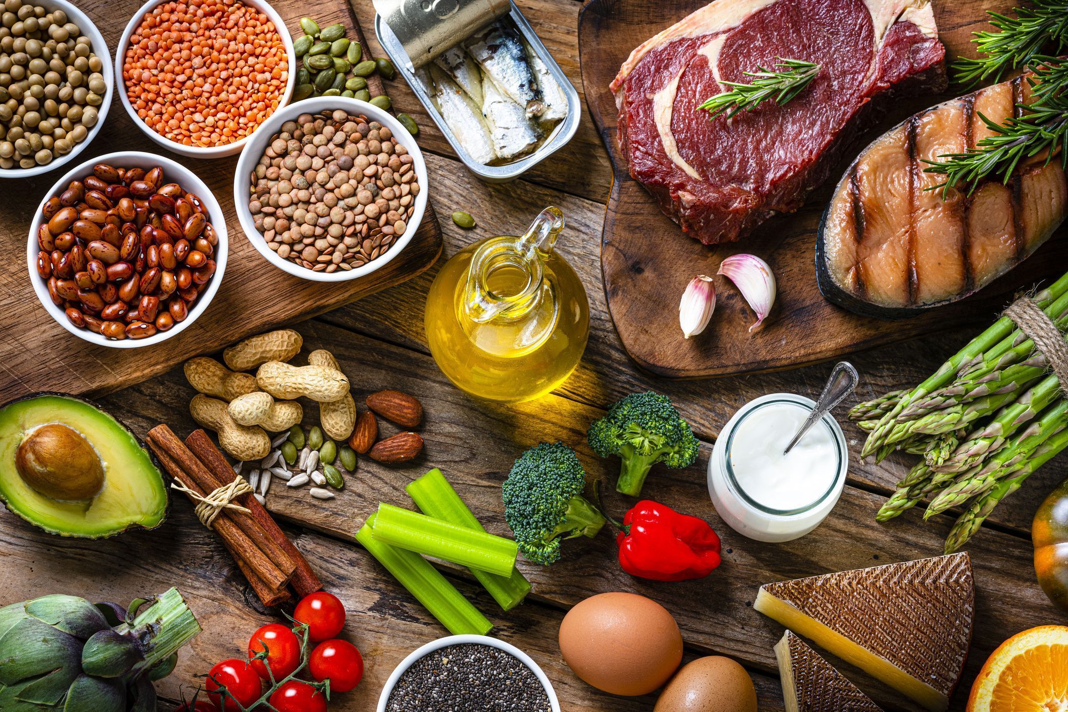 Fresh healthy organic food for balanced diet on wooden table