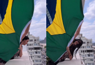 No Rio, Katy Perry aparece em janela de hotel com bandeira do Brasil; veja