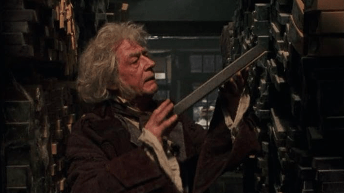 John Hurt como Sr. Olivaras em "Harry Potter" • Divulgação