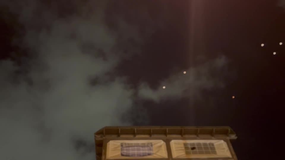 Projectiles flying over Jerusalem in Iranian missile salvo on Israel