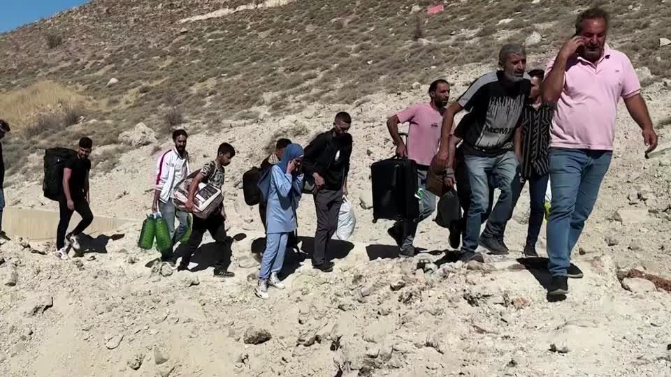 Israeli strike closes road used by hunderds to flee Lebanon to Syria