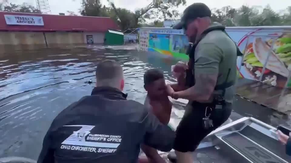 Teen floating on debris in Tampa floodwaters is rescued