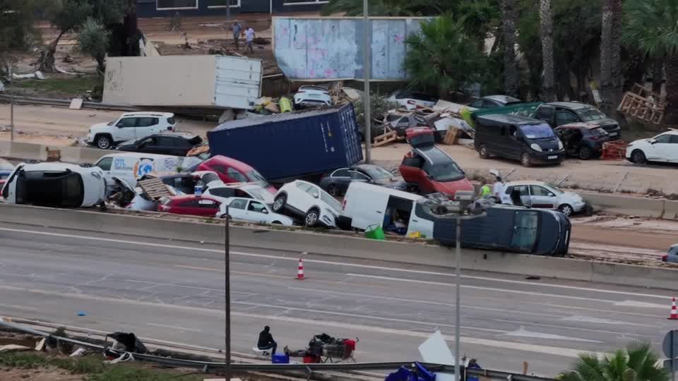 Drone video shows vehicles piled up on road in Valencia region