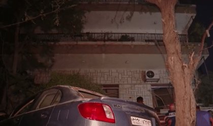Prédio atingido por bombardeio em Damasco