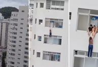 Vídeo: mulher quase cai de prédio ao limpar janela em Guarujá (SP)