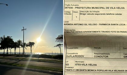 Motociclista parado em semáforo é multado por tirar foto de paisagem; veja o que diz a lei