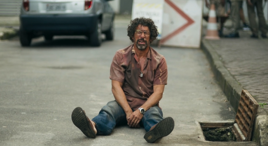 Osmar (Milhem Cortaz) será acusado por crime em "Volta Por Cima". • Reprodução/Globoplay
