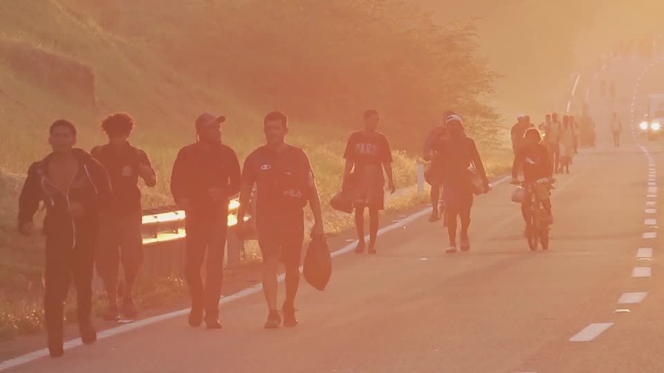 Migrants anticipate challenges near US border as caravan treks through southern Mexico