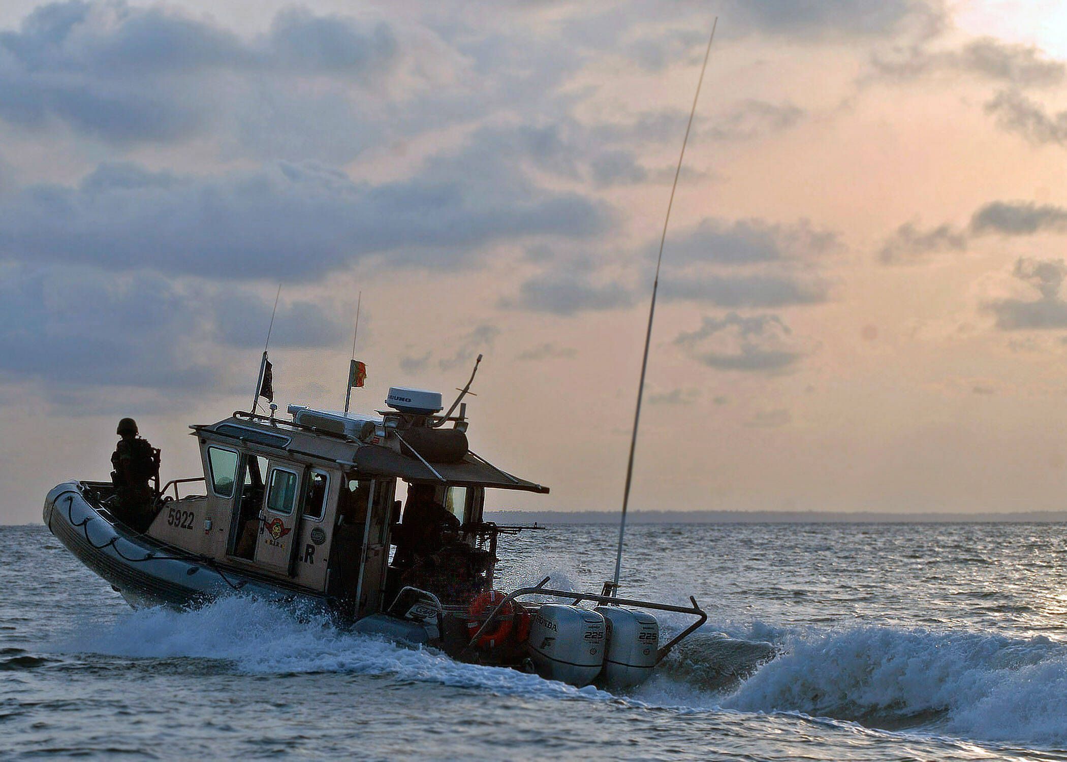 110323-N-HI707-140 DOUALA, Cameroon (March 23, 2011) A Cameroonian Rapid Intervention Battalion (BIR) boat patrols the C