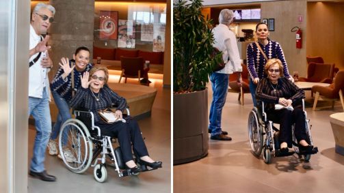 Gloria Menezes passeia no shopping com filho e nora