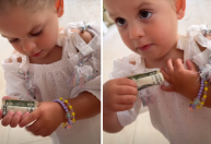 Maria Flor recupera dólar que deixou cair e esconde na roupa: "É meu"