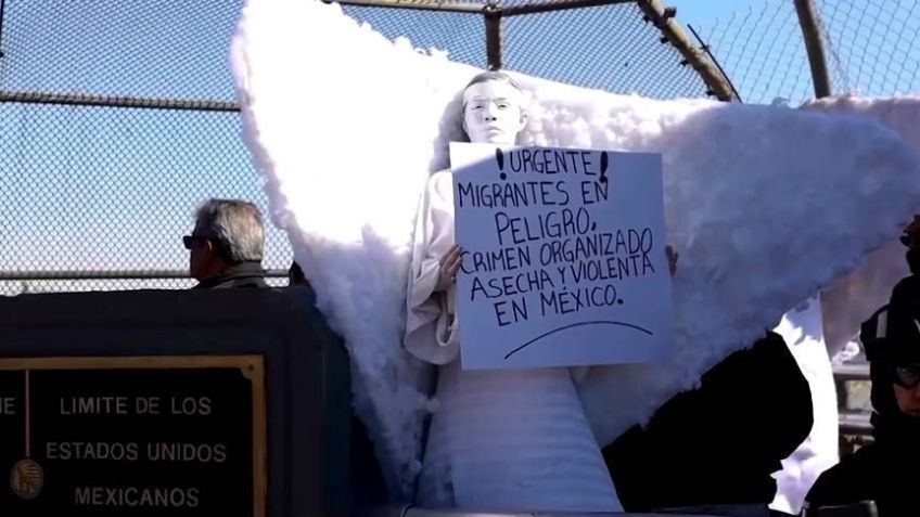 Na ponte da fronteira de Ciudad Juarez, jovens vestidos de anjos, parte do coletivo Angels Messengers, usavam túnicas e pintura facial branca e prata • Reprodução/Reuters