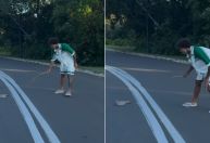 MC Livinho salva cobra na estrada; veja momento