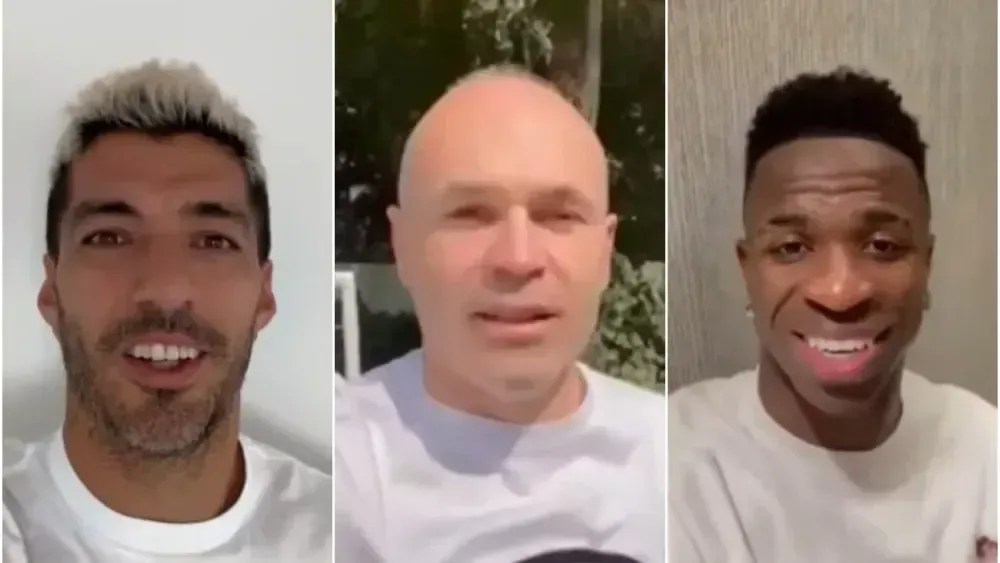 Suárez (esq), Iniesta (centro) e Vini Jr. (dir)