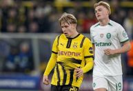 Borussia Dortmund administra vantagem e elimina Sporting na Champions