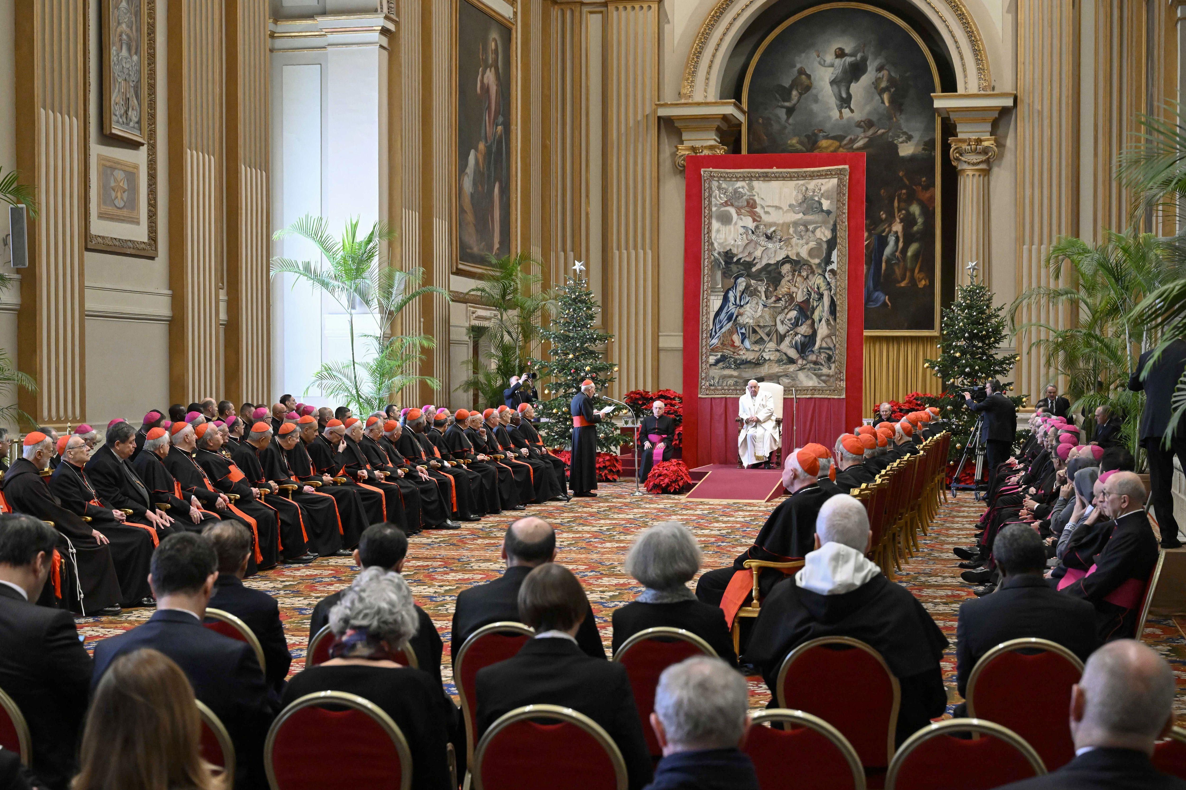 Pope Francis attends an audience with cardinals and bishops for the annual exchange of Christmas greetings