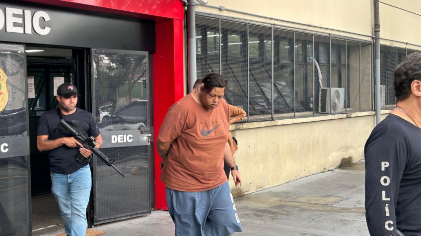 Jeferson de Souza saindo do Deic na manhã desta quarta-feira (19). • CNN