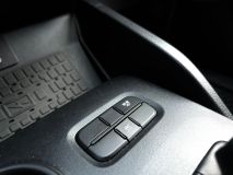 Botões do controle de tração e modos de condução